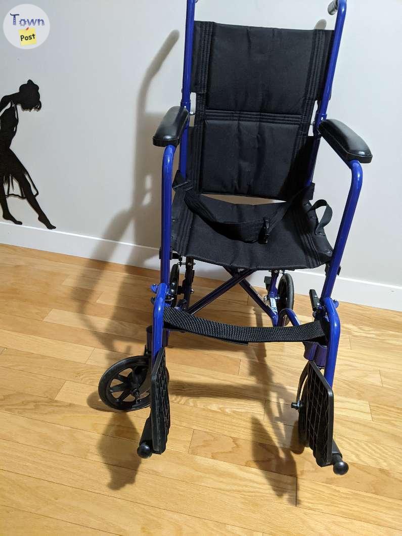 Photo of  Transport Wheelchair,          Drive Medical Deluxe Lightweight 