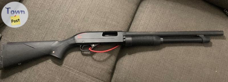 Photo of Winchester SXP 12 gauge defender pump action shotgun 